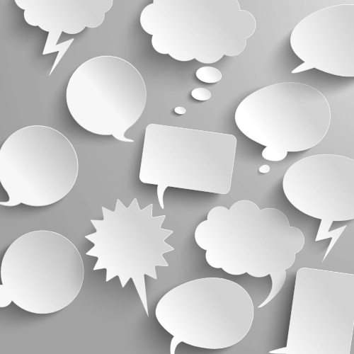 Paper cutouts of speech bubbles